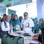 PKK Palembang & Bank Sumsel Babel Syariah Gaungkan Ekonomi Rakyat di Pasar Bedug